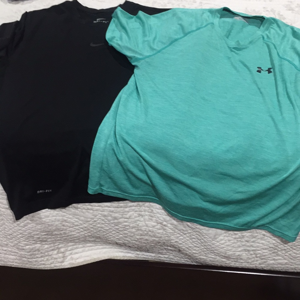 Two athletic shirts. 1 under armor 1 Nike
